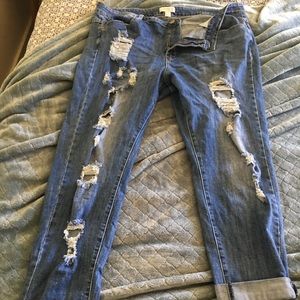 Distressed boyfriend fit jeans.